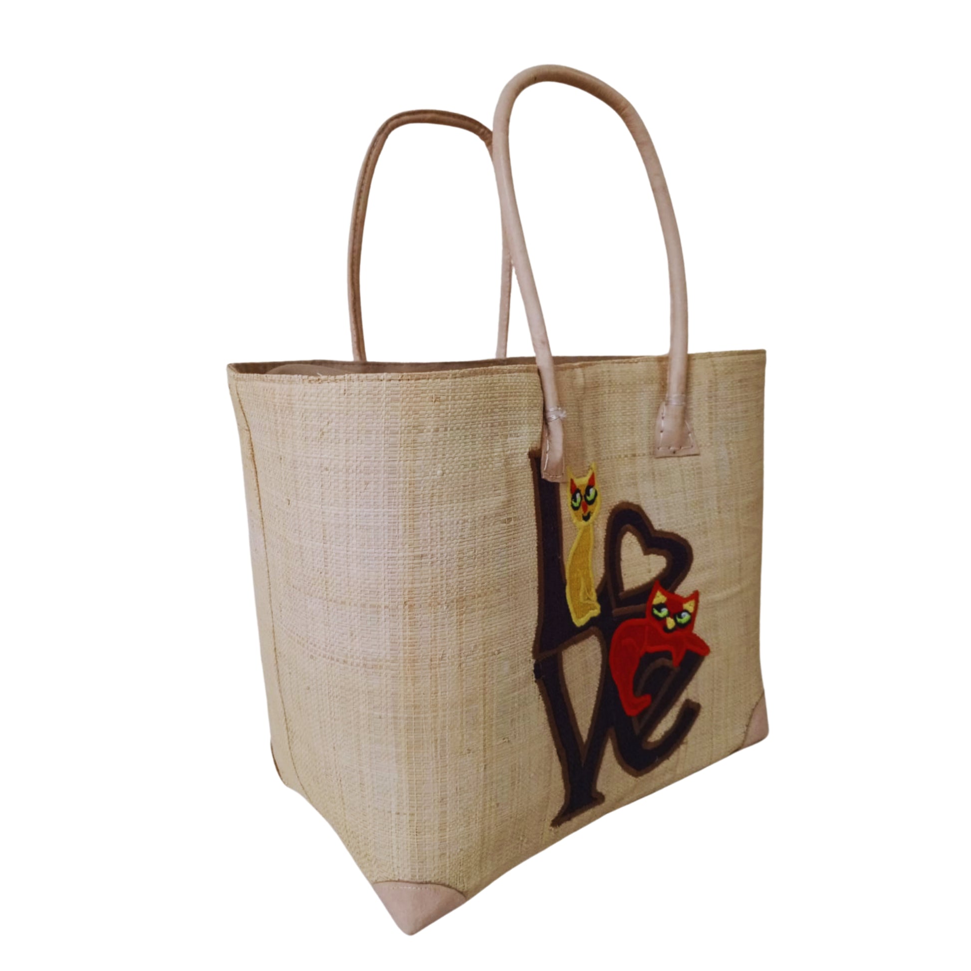 Beige love cat embroidery basket from raffia palm leaves. handmade in Madagascar. 