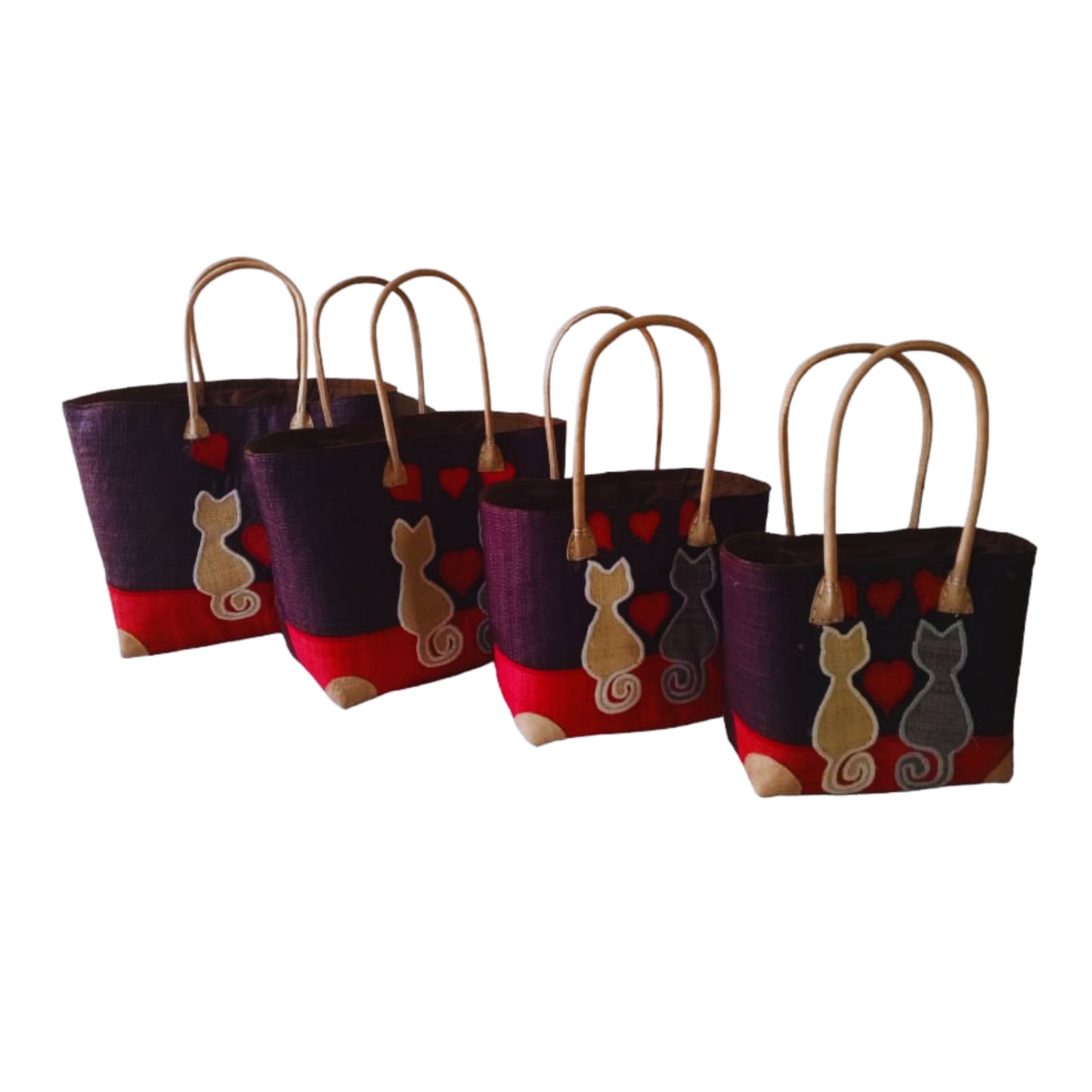 Woven baskets with cat embroidery, leather handle and drawstring closure. Handmade in Madagascar