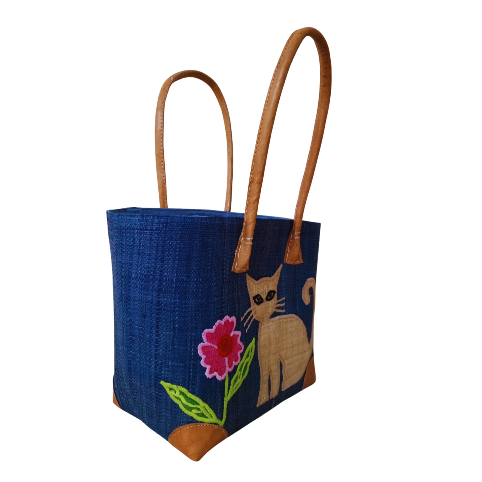 Blue woven basket with cat embroidery, leather handle and drawstring closure. handmade in Madagascar. 