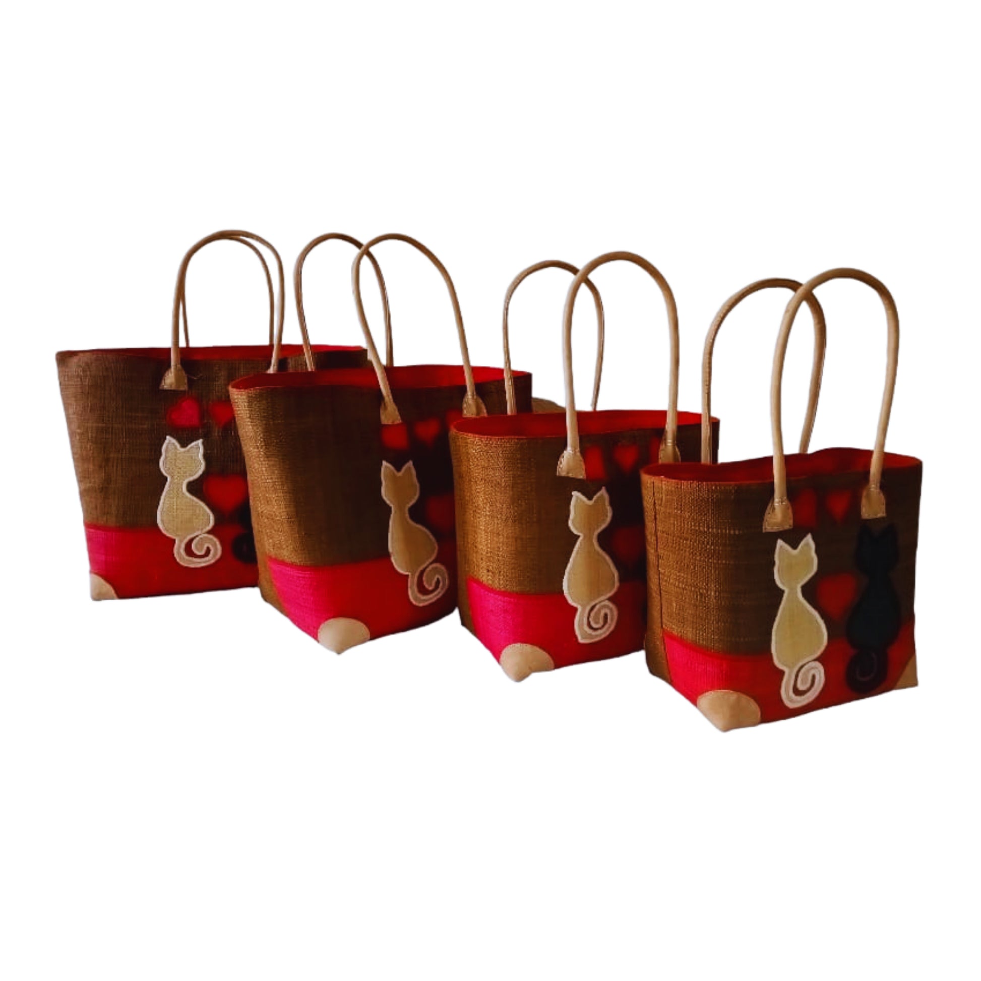 Woven baskets with cat embroidery, leather handle and drawstring closure. Handmade in Madagascar