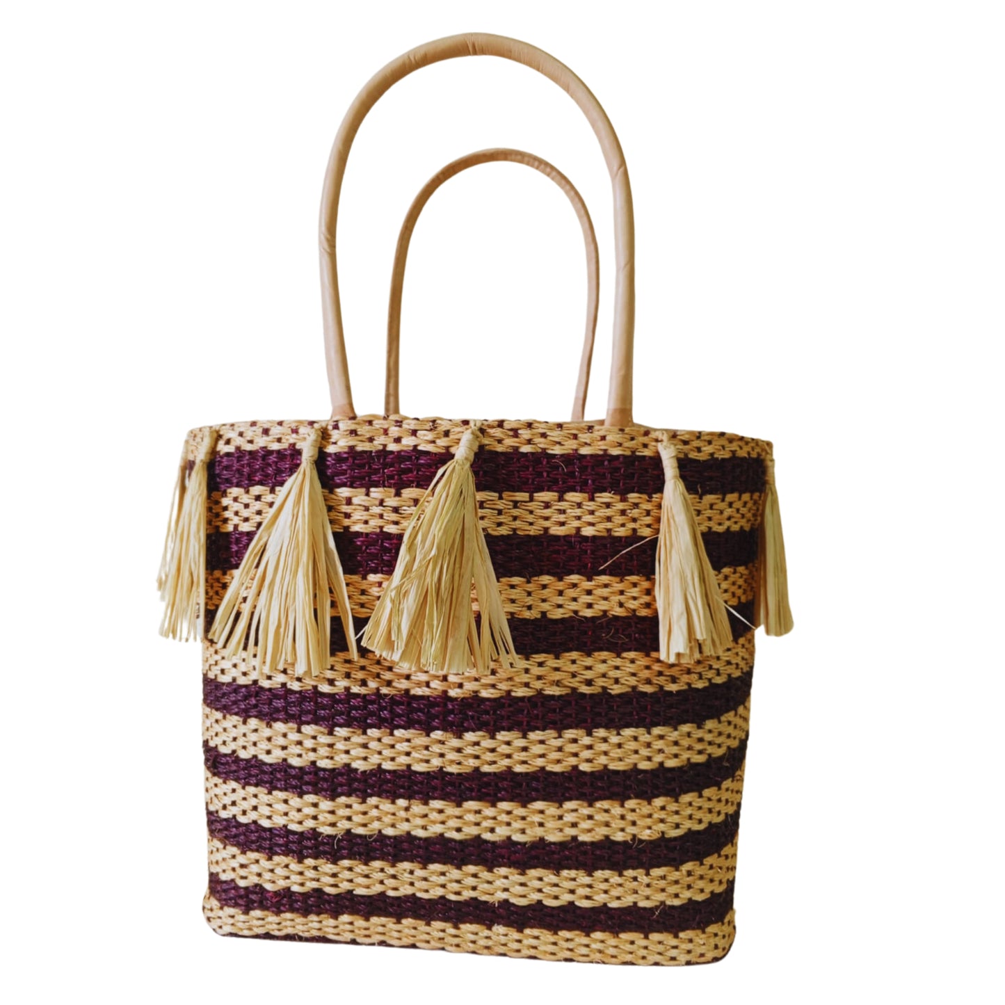 Brown handmade woven basket with tassel. Leather handle and drawstring closure. Handmade in Madagascar 