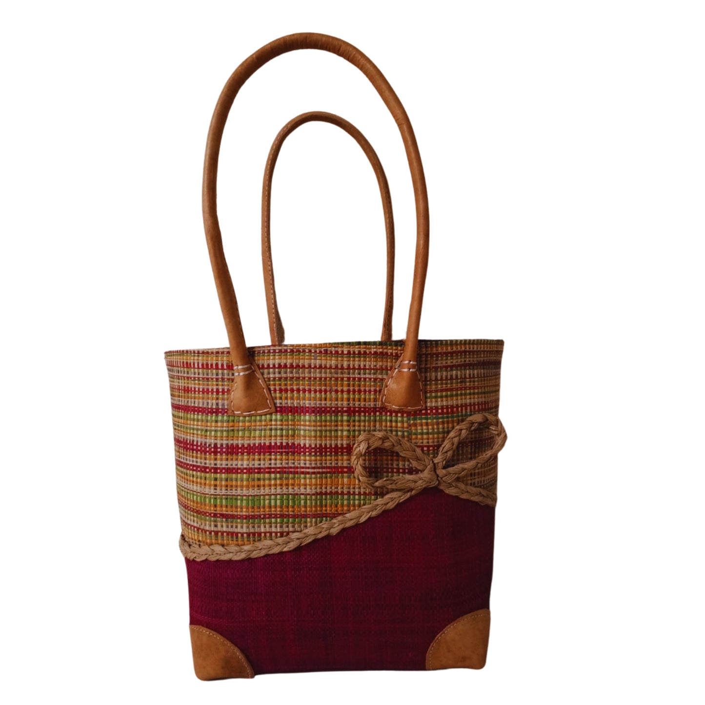 burgundy woven basket with a bow at the front. Handmade in Madagascar. 