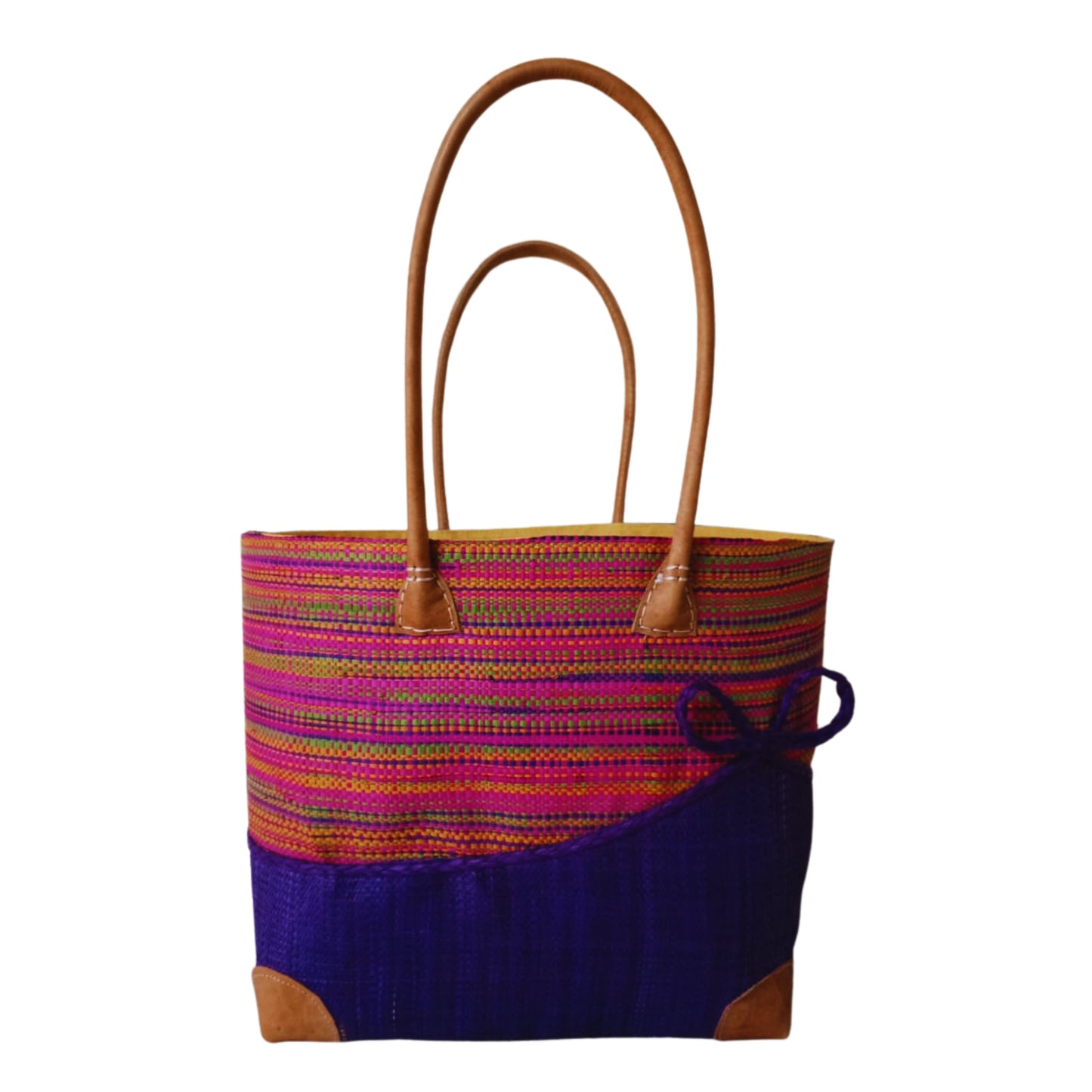 Navy Blue woven basket with a bow at the front. Handmade in Madagascar. 