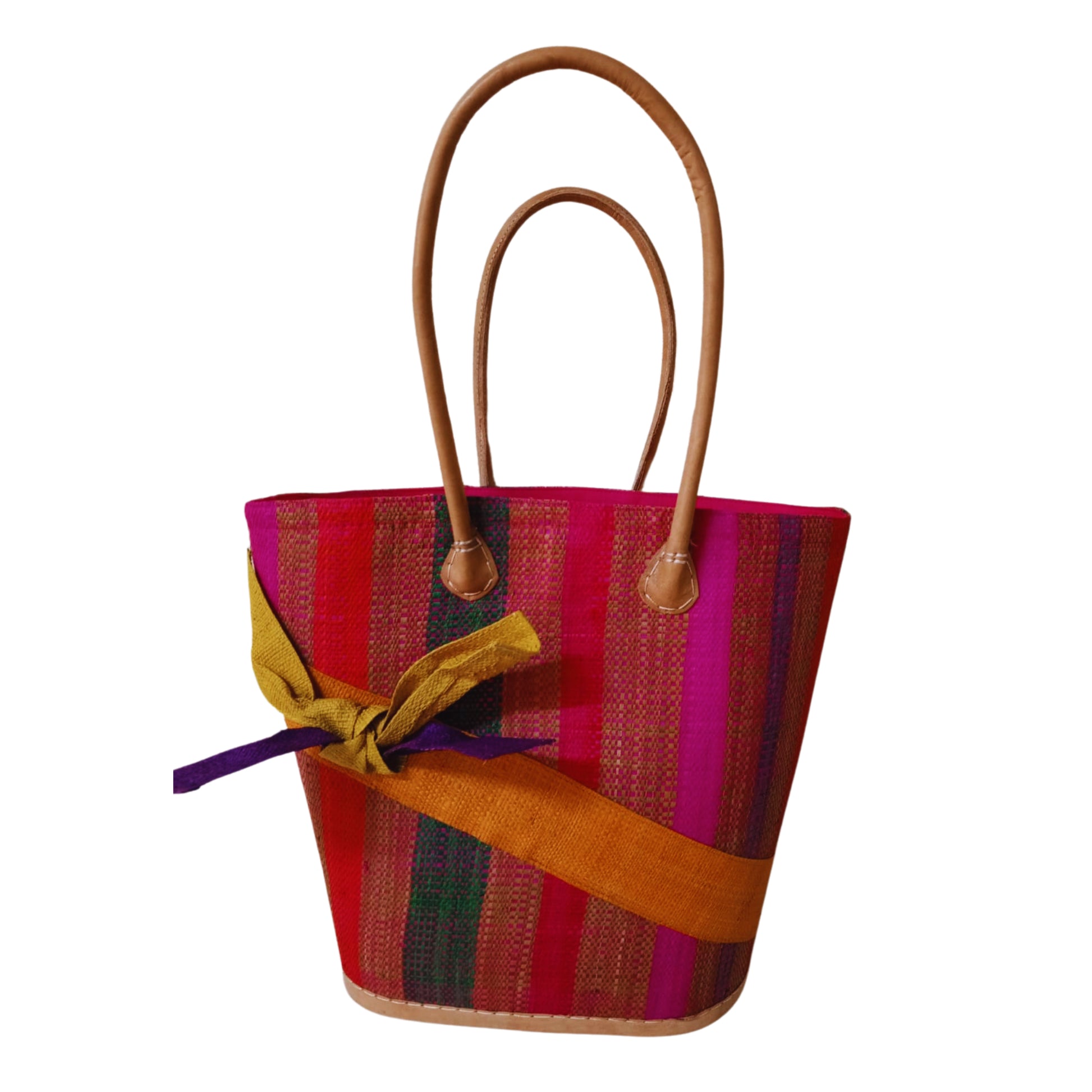 Pink and yellow woven basket with a raffia bow. Handmade in Madagascar. 