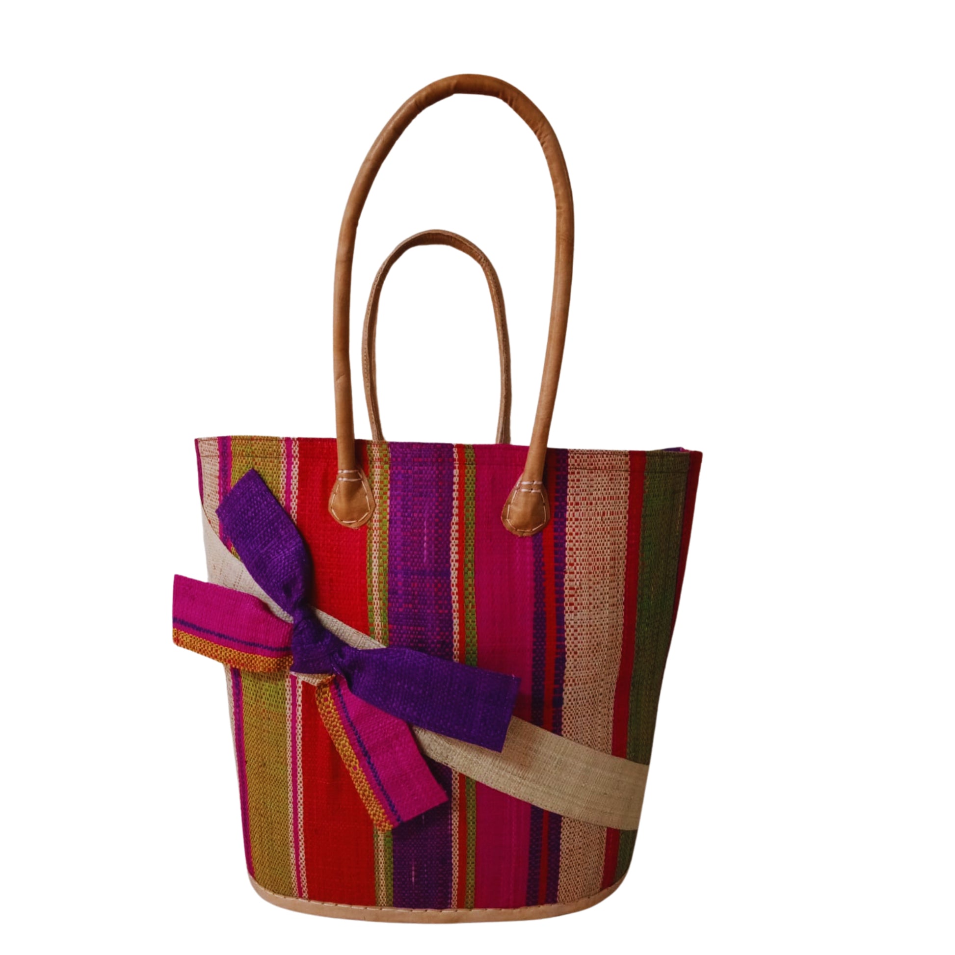 Pink and purple woven basket with a raffia bow. Handmade in Madagascar. 