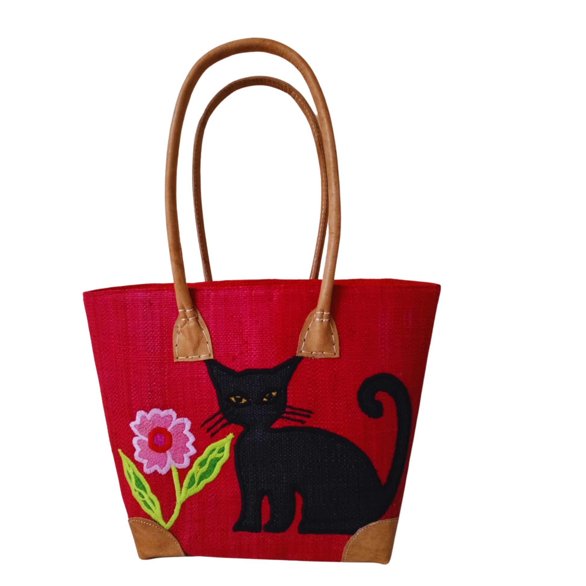 Red woven basket with cat embroidery, leather handle and drawstring closure. handmade in Madagascar. 