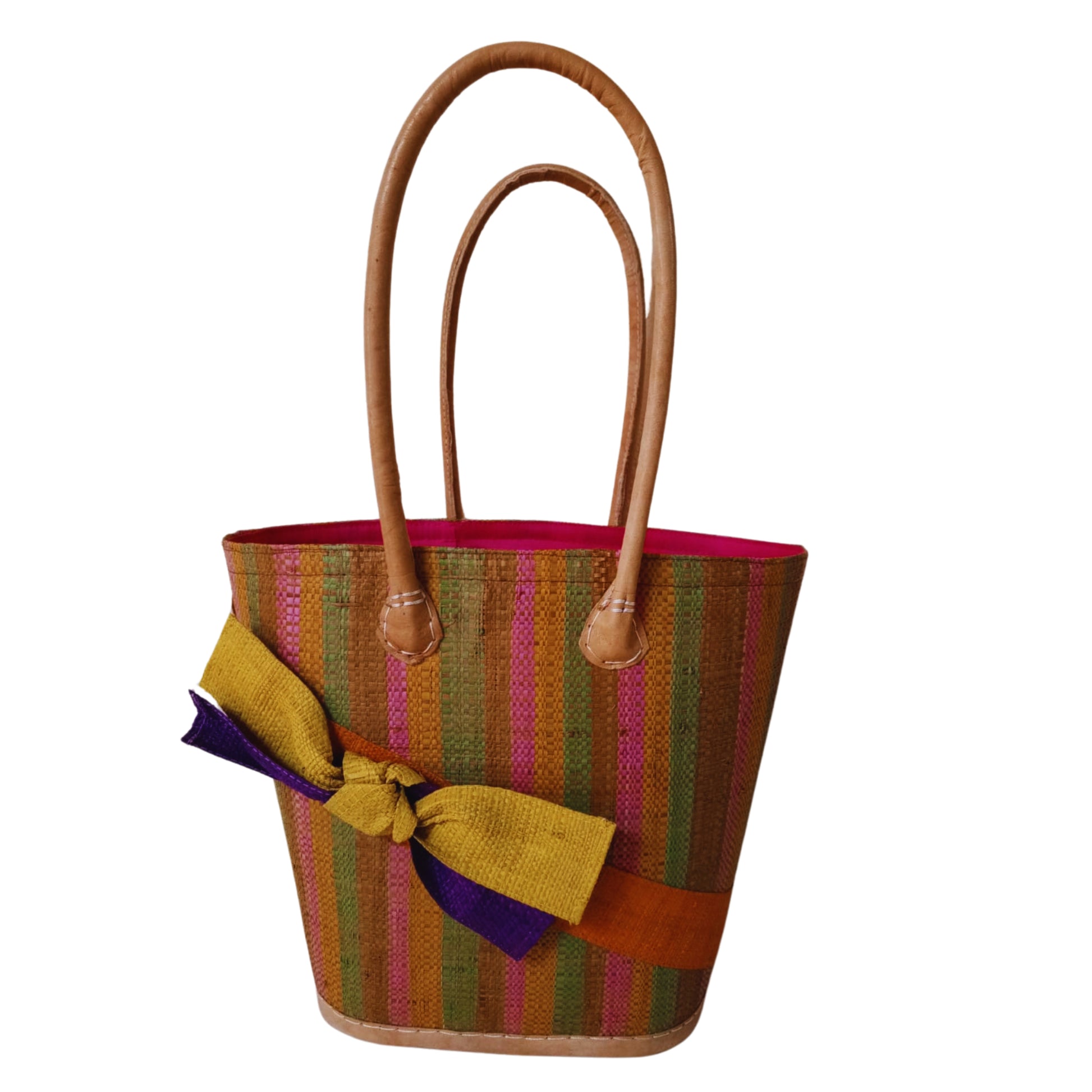 Yellow woven basket with a raffia bow. Handmade in Madagascar. 