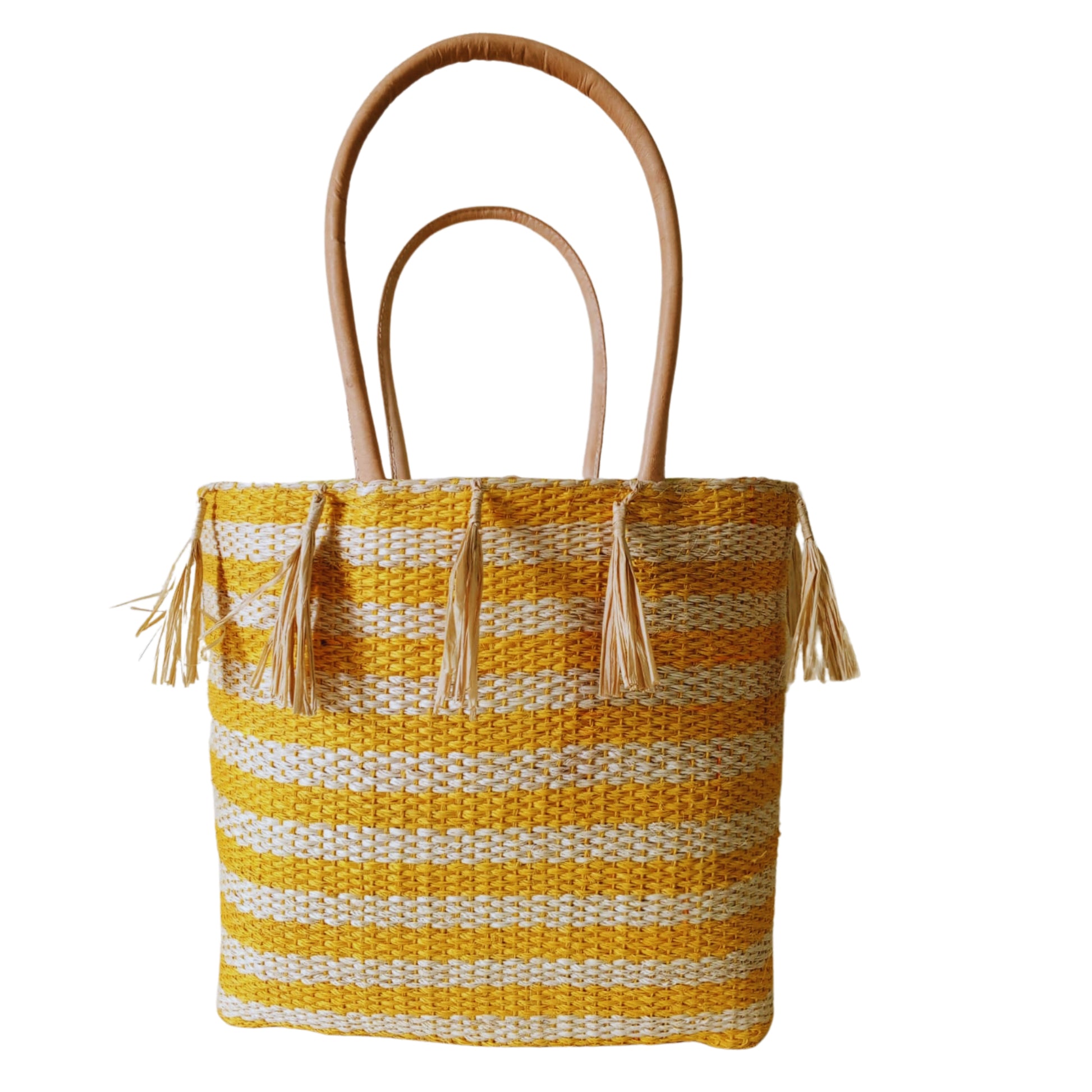 Yellow handmade woven basket with tassel. Leather handle and drawstring closure. Handmade in Madagascar 