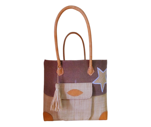 NatsNco handmade raffia, women,beige basket with star embroidery, front pocket and leather handle & drawstring closure. Made in Madagascar