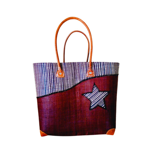 NatsNco handmade raffia, women,brown basket with star embroidery and leather handle & drawstring closure. Made in Madagascar