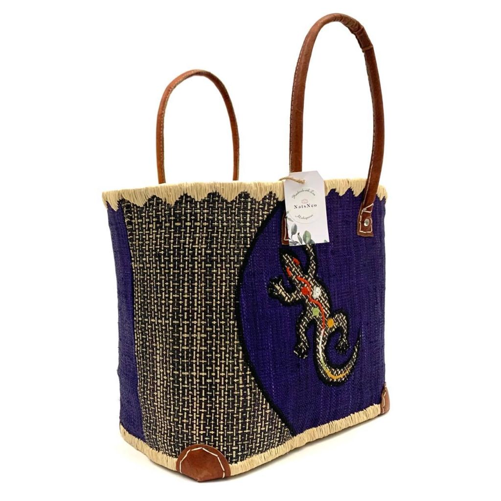 Blue raffia basket for women. With a lizard embroidery on the front and leather handle. Handmade with Love in Madagascar