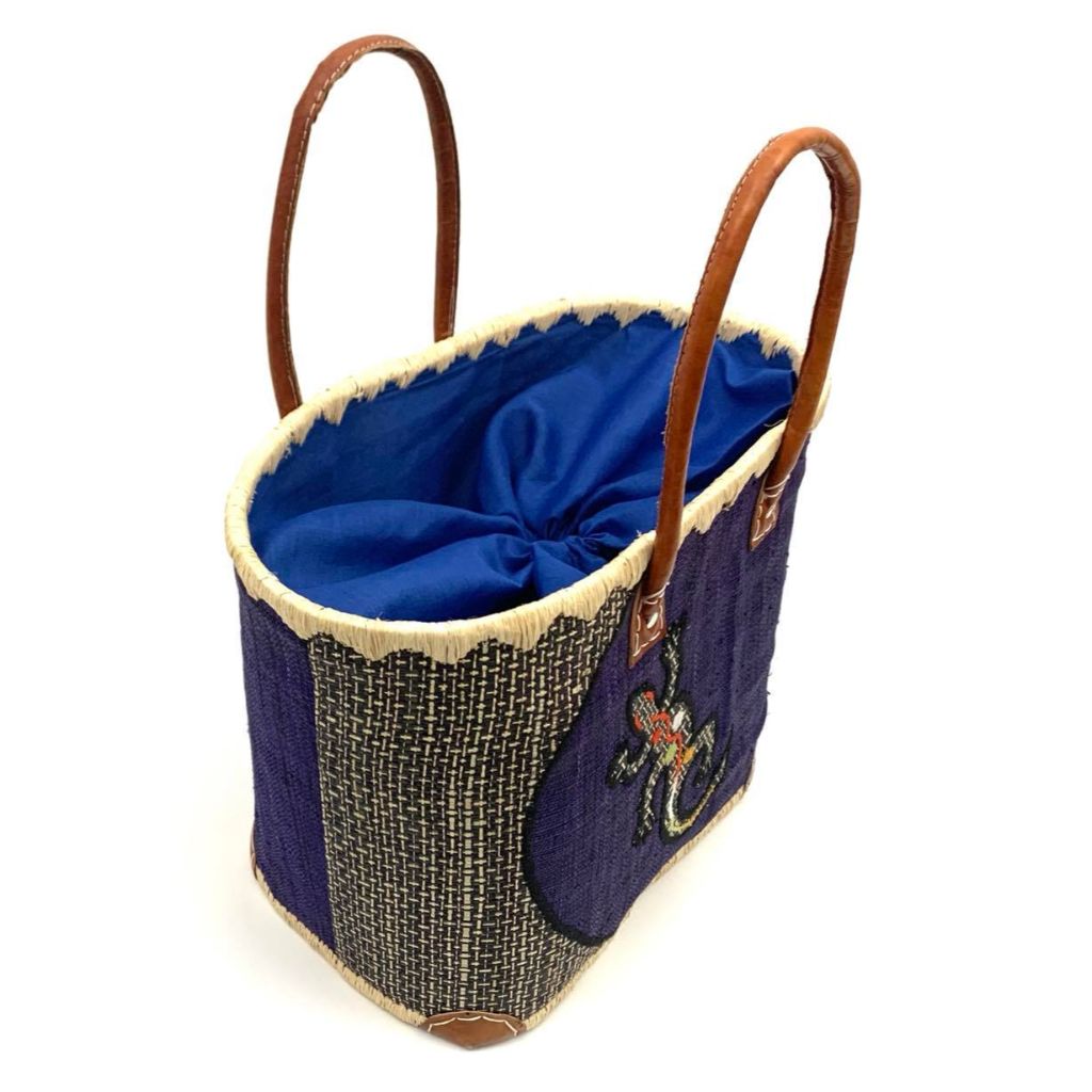 Blue raffia basket for women. With a lizard embroidery on the front and leather handle. Handmade with Love in Madagascar