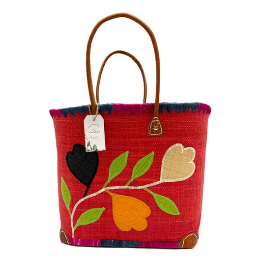 Red raffia basket for women. With a colourful leaves embroidery on the front and leather handle. Handmade with Love in Madagascar