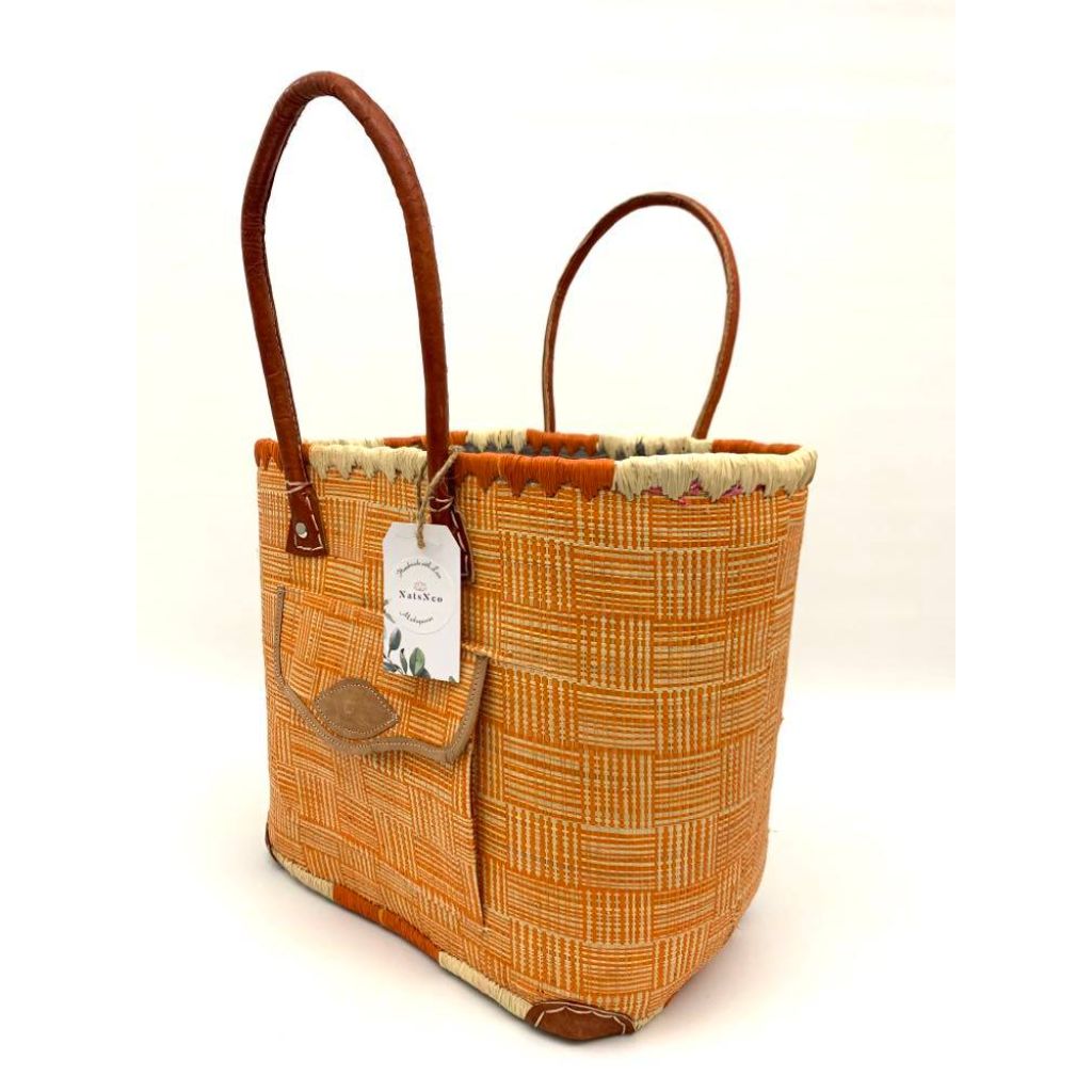 Orange raffia basket in 3 different sizes, with front and inside pockets & leather handle. Handmade in Madagascar with love. 