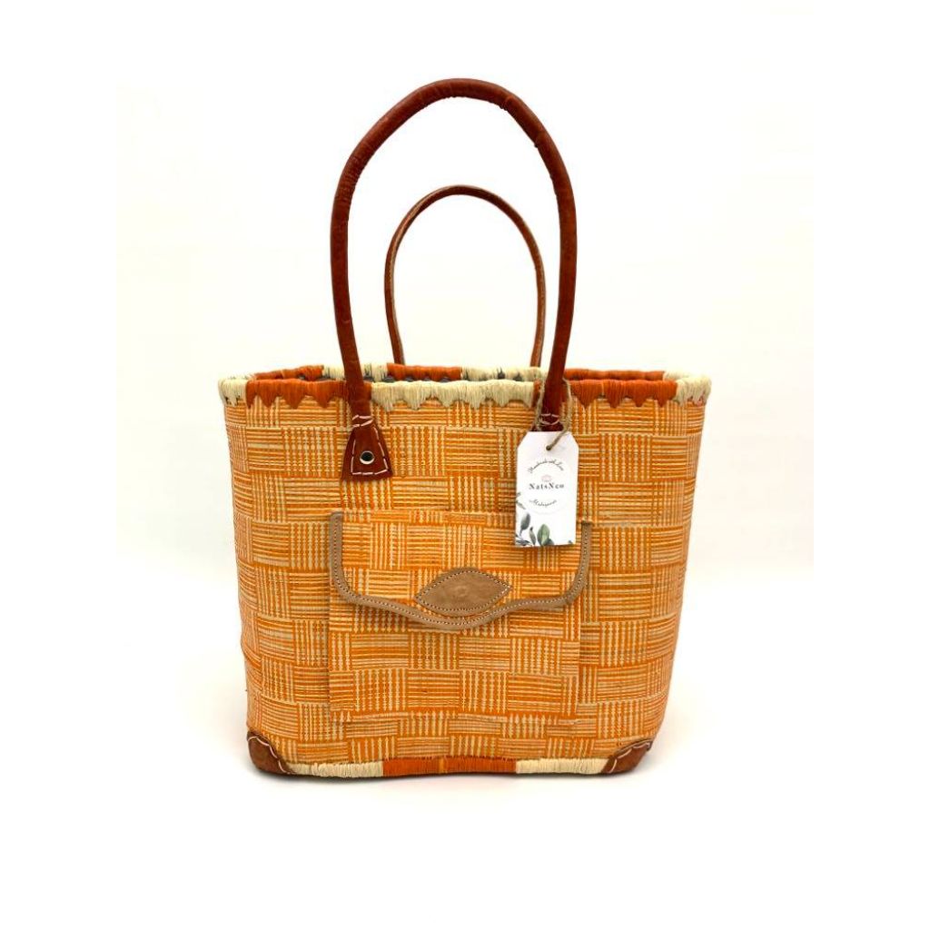 Orange raffia basket in 3 different sizes, with front and inside pockets & leather handle. Handmade in Madagascar with love. 